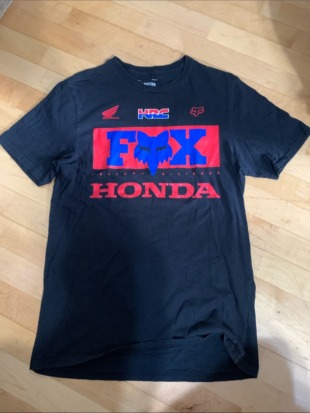 Fox Black Short Sleeve Tee with Red and Blue Chest Graphic